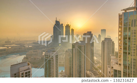 Foggy morning sunrise in downtown of Dubai timelapse. Foggy morning sunrise in downtown of Dubai timelapse. 138231627