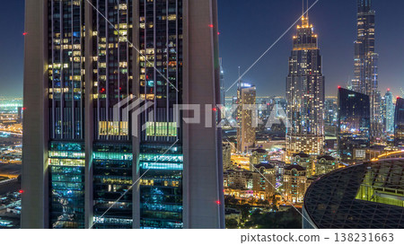 Dubai downtown skyline night timelapse with tallest building and Sheikh Zayed road traffic, UAE 138231663