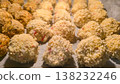Sushi balls made of breaded rice and filling, baked in the oven, homemade food 138232246
