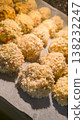 Sushi balls made of breaded rice and filling, baked in the oven, homemade food 138232247