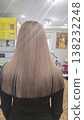 Blonde hair. Hair coloring and drying process at a beauty salon. Medium length. 138232248