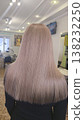 Blonde hair. Hair coloring and drying process at a beauty salon. Medium length. 138232250