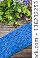Crocheting a green yarn item. Handmade embellishments Pattern texture Copy space 138232253