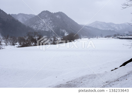 A winter landscape of Minami-Aizu in the snow, with vast snowfields and snow-covered mountain ranges stretching out before you in the countryside. A winter landscape of Minami-Aizu in the snow, with vast snowfields and snow-covered mountain ranges stretching out before you in the countryside. 138233643