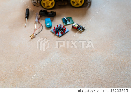Blur background for copy space text on robotics, assembly and repair of micro components board with diodes Blur background for copy space text on robotics, assembly and repair of micro components board with diodes 138233865