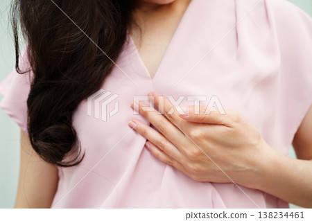 Asian woman self touching check lump or Breast cancer, Breast Self Exam. Asian woman self touching check lump or Breast cancer, Breast Self Exam. 138234461