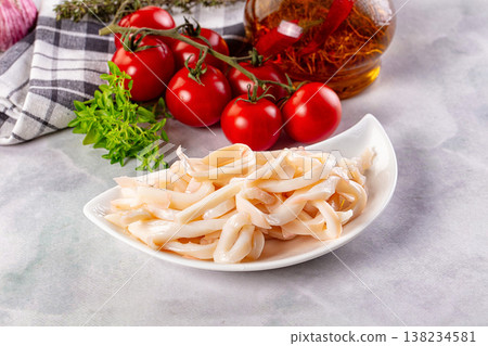 Canned marinated squid rings heap Canned marinated squid rings heap 138234581