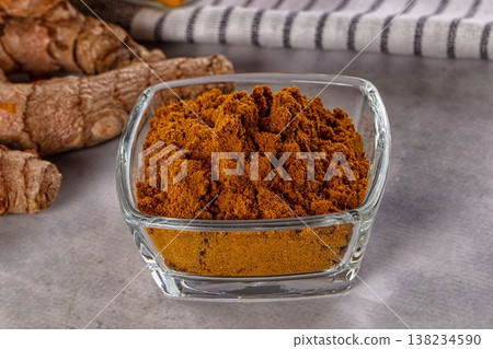 Indian spices - Curry powder heap 138234590