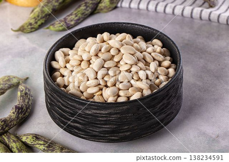 Raw dry white beans heap 138234591