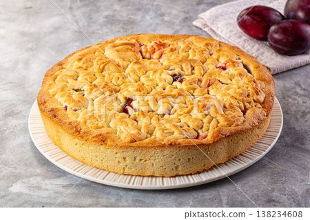 Sweet homemade pie with plums 138234608