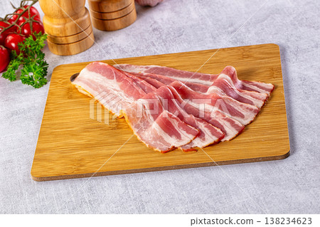 Raw bacon pork meat slices Raw bacon pork meat slices 138234623