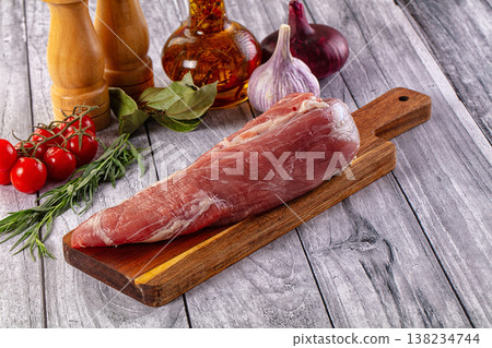 Raw pork sirloing over board 138234744