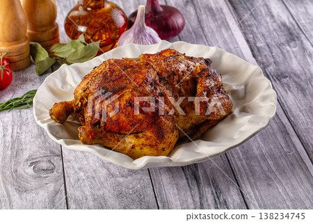 Hot tasty grilled whole chicken 138234745