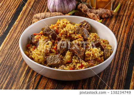 Asian traditional pilaf with beef Asian traditional pilaf with beef 138234749
