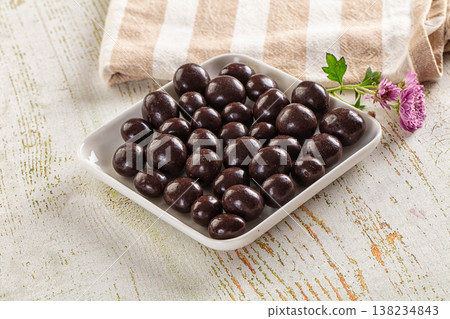Nut in chocolate balls sweet candy 138234843