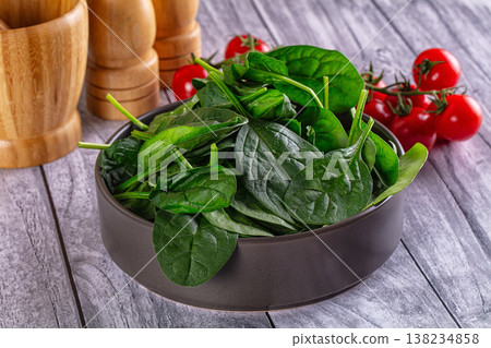 Green spinach leaves heap in the bowl Green spinach leaves heap in the bowl 138234858