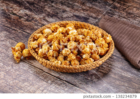 Sweet crunchy popcorn with caramel Sweet crunchy popcorn with caramel 138234879