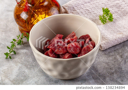 Diced raw beef meat cubes Diced raw beef meat cubes 138234894
