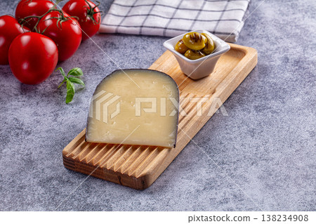 French Gruyere cheese over board French Gruyere cheese over board 138234908
