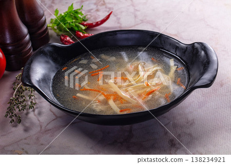 Clear chicken soup with noodles 138234921