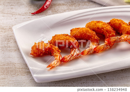 Golden fried panko shrimp appetizer on a white plate with sweet chili sauce Golden fried panko shrimp appetizer on a white plate with sweet chili sauce 138234948