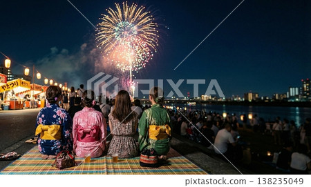 Couples, groups of women, and families enjoying the summer tradition of fireworks displays. 138235049