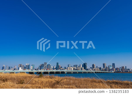 Osaka City: Yodogawa River embankment and the high-rise building district of Umeda Osaka City: Yodogawa River embankment and the high-rise building district of Umeda 138235183