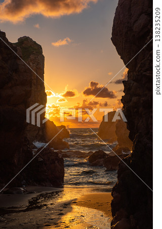 Praia da Ursa beach, Sintra-Cascais Natural Park, Portugal, cliffs in the sea at sunset 138235209