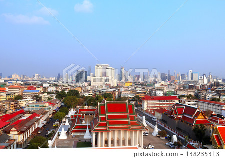 Aerial view cityscape of Bangkok with modern and old residential neighbourhood. Top view of Bangkok from Wat Saket Ratchawora, Thailand. Topic of summer vacation, relaxing, travel, trip, cruises, tour Aerial view cityscape of Bangkok with modern and old residential neighbourhood. Top view of Bangkok from Wat Saket Ratchawora, Thailand. Topic of summer vacation, relaxing, travel, trip, cruises, tour 138235313