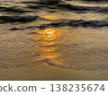 Golden sunrise over ocean waves on sandy beach tropical seascape Vietnam travel background 138235674