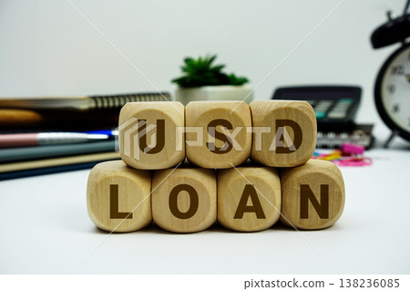 USD Loan alphabet letters with calculator and alarm clock on white background USD Loan alphabet letters with calculator and alarm clock on white background 138236085