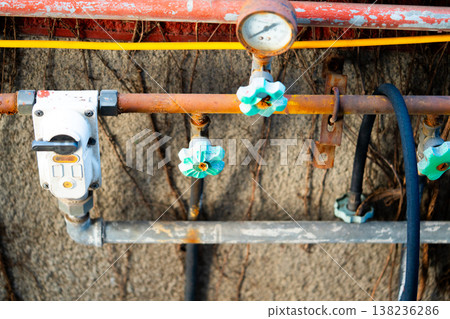 Curves of the gas pipe on the background wall. Multiple city gas meters. Korea Curves of the gas pipe on the background wall. Multiple city gas meters. Korea 138236286