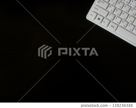 White keyboard on the desk 138236388