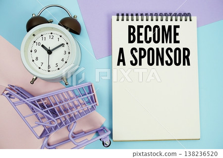 Become A Sponsor text written on notepad with alarm clock and trolley shopping cart 138236520