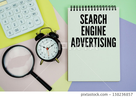 Search Engine Advertising text with calculator, alarm clock and magnifying glass 138236857