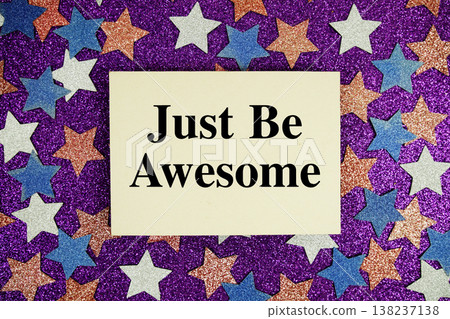 "Just Be Awesome" quotes on paper card with purple glitter background with white, pink and blue stars 138237138