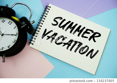 Summer Vacation text written on notepad with alarm clock flat lay on multicolor pastel background Summer Vacation text written on notepad with alarm clock flat lay on multicolor pastel background 138237805