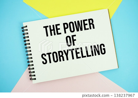 The Power Of Storytelling text written on notepad flat lay on multicolor pastel background 138237967