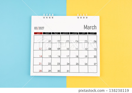 March 2027 calendar on blue and yellow background, Flat lay. March 2027 calendar on blue and yellow background, Flat lay. 138238119