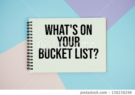 What's On You Bucket List? text written on notepad flat lay on multicolor pastel background 138238298