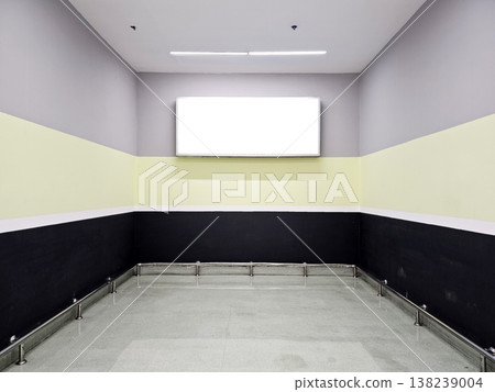 Minimalist room with blank advertising board on the wall, reminiscent of a liminal space Minimalist room with blank advertising board on the wall, reminiscent of a liminal space 138239004