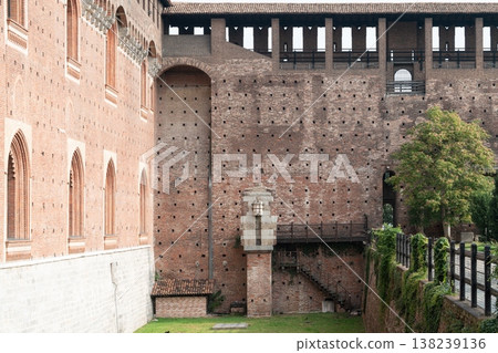 Historic brick fortifications and inner courtyard details of Sforza Castle in Milan, Italy Historic brick fortifications and inner courtyard details of Sforza Castle in Milan, Italy 138239136