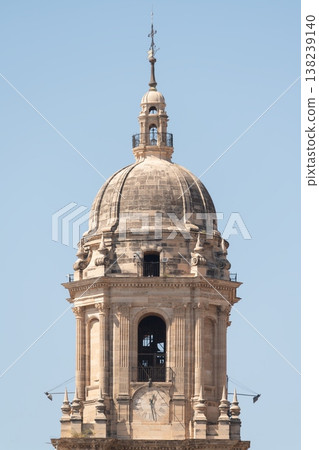 Malaga Cathedral bell tower close up against blue sky. Malaga, Spain 138239140
