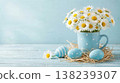 Easter decoration with blue eggs and daisies in mug on nest Easter decoration with blue eggs and daisies in mug on nest 138239307