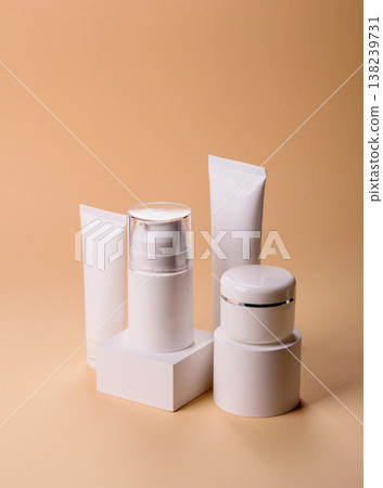 A set of empty white plastic or aluminum jars, tubes as mockup. Empty cosmetic jar and tube mockups 138239731