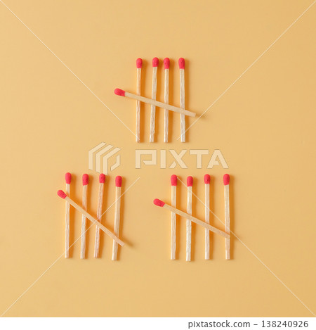 Pile of red head matchsticks on color background. Pile of red head matchsticks on color background. 138240926