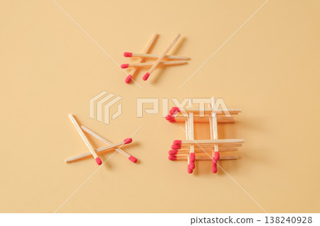 Pile of red head matchsticks on color background. 138240928
