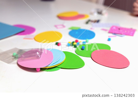 Flat lay of easter craft supplies for kids sensory play and education Flat lay of easter craft supplies for kids sensory play and education 138242303
