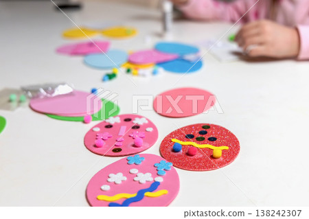 Flat lay of easter craft supplies for kids sensory play and education Flat lay of easter craft supplies for kids sensory play and education 138242307