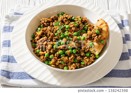 keema matar with minced meat, peas and naan 138242398